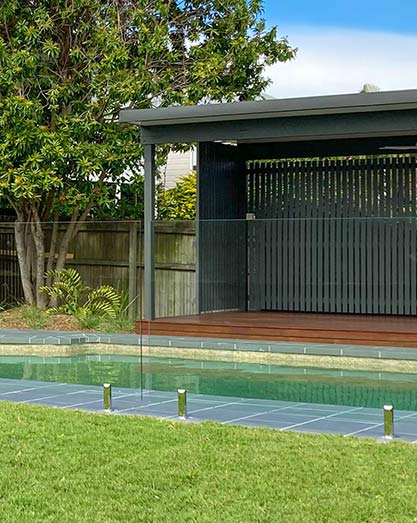 Glass pool fencing and cabana outdoor room
