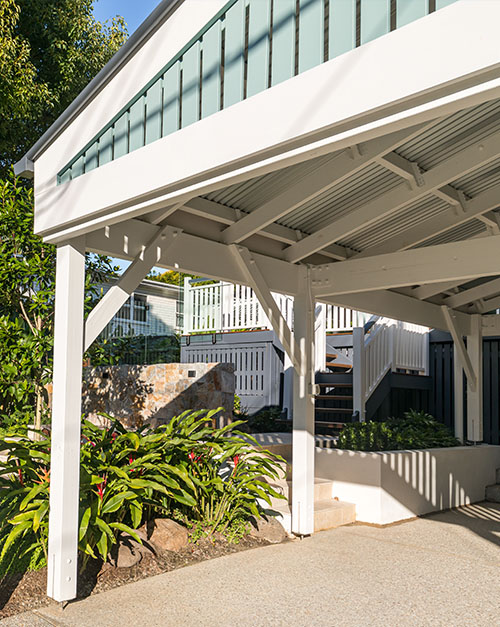 Open timber carport reflecting style of existing dwelling