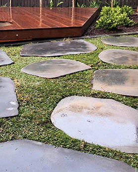 Paved stones in lawn